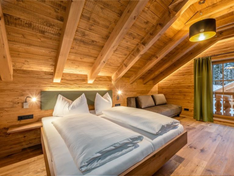 in den Schlafzimmern haben bis 4 Personen Platz